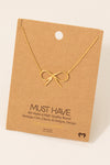 Gold Dipped Bow Tie Pendant Necklace in Gold