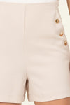 beige shorts w/ button detail